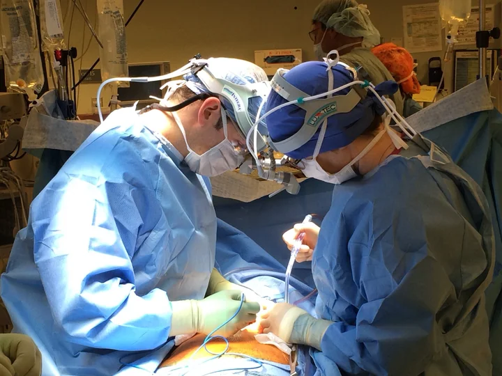 Surgeons working together during an operation